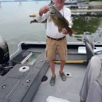 John Leskew of Cumberland Beach caught this 21.5-inch smallmouth in six feet of water over rocks using a Yum Mighty Worm.