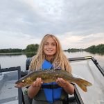 Sheldon Crawford of Greely records Bria, 11, and her personal-best walleye (45 cm) caught all by herself on the Rideau River.