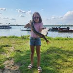 Kyle Adamcewicz of Oshawa was pleased when Abigail, 7, caught her first fish on Seymour Lake.