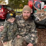 Adam Lee of Huntsville documents future hunter, Morgan, celebrating his Uncle’s archery buck in Huntsville.
