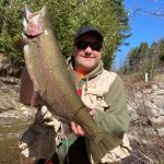 Bradley Chapman of Midland caught his personal-best rainbow trout on a Georgian Bay tributary after having his vehicle liberated from two feet of mud by a couple of Good Samaritans.