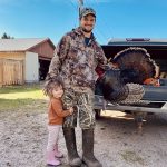 Brock Cadwell of South River is teaching his daughter, Isla, where food comes from in WMU 47.