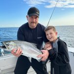 Ian Aubrey of Trent Lakes and his son, Jackson, caught their first salmon together on Lake Ontario.