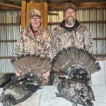 Tyler and Reid Belfry of Petawawa enjoyed a father-and-son double in the rain in WMU 48.